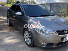 Cần bán gấp Kia Cerato 1.6MT sản xuất năm 2010, màu xám, nhập khẩu Hàn Quốc