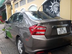 Cần bán lại xe Honda City 1.5MT 2014, màu nâu 