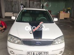 Cần bán lại xe Ford Laser Ghia 1.8 năm sản xuất 2003, màu trắng số tự động