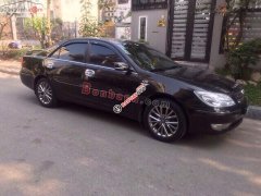 Cần bán lại xe Toyota Camry 3.0V đời 2005, màu đen 