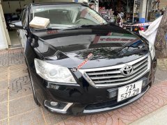 Cần bán Toyota Camry 2.4 đời 2011, màu đen còn mới