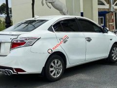 Cần bán Toyota Vios J đời 2014, màu trắng còn mới, giá tốt