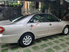 Cần bán lại xe Toyota Camry 2.4 năm 2003, màu hồng