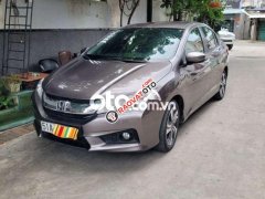 Cần bán xe Honda City AT đời 2014, màu xám còn mới