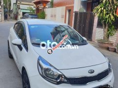 Bán Kia Rio AT đời 2014, màu trắng còn mới