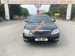 Bán Toyota Camry 2.4G đời 2006, màu đen còn mới, 310tr