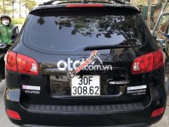 Cần bán Hyundai Santa Fe AT đời 2009, màu đen, xe nhập