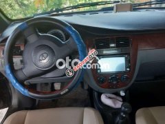 Bán Daewoo Lacetti MT năm sản xuất 2009, màu đen giá cạnh tranh