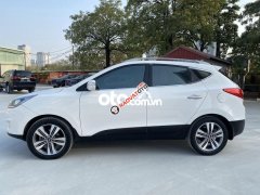 Bán ô tô Hyundai Tucson 2.0AT sản xuất năm 2014, màu trắng, nhập khẩu như mới