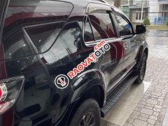 Cần bán Toyota Fortuner 2.7V năm sản xuất 2016, màu đen xe gia đình, 635tr