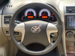 Cần bán xe Toyota Corolla 1.8G AT năm 2014, màu bạc