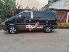 Cần bán lại xe Hyundai Starex 9 chỗ máy dầu sản xuất 2001, màu đen, giá chỉ 195 triệu