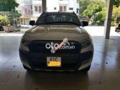 Cần bán xe Ford Ranger Wildtrak 3.2 4x4AT sản xuất 2016, màu trắng  