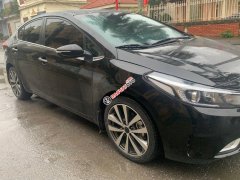 Cần bán Kia Cerato 1.6MT sản xuất năm 2017, màu đen, 445tr