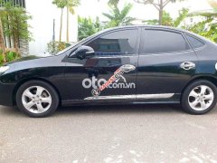 Cần bán lại xe Hyundai Avante 1.6AT sản xuất 2011, màu đen