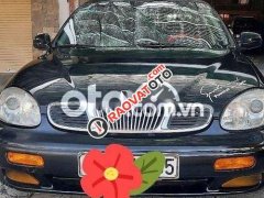 Cần bán gấp Daewoo Leganza sản xuất năm 2002, màu đen, xe nhập, 87tr