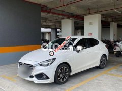 Bán xe mazda 2 sedan màu trắng 1.5 AT năm 2016 đẹp