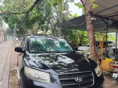 Chính chủ bán xe SANTAFE đăng ký 2009  máy  xăng 12 lít /100km, số tay