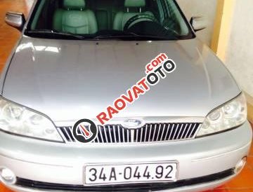 Cần bán lại xe Ford Laser Ghia 1.8 đời 2003, màu bạc, xe gia đình