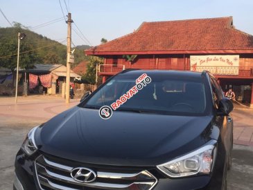 Bán nhanh xe chính chủ Hyundai Santa Fe 2.4 AT 2WD sản xuất năm 2016, màu đen, 850 triệu