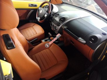 Xe Volkswagen New Beetle mui trần, đăng ký lần đầu 2003, màu vàng xe nhập