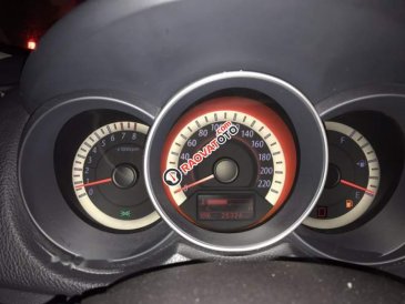 Tôi cần bán xe Kia Forte màu đen, số sàn năm 2011, xe gia đình