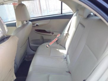 Bán ô tô Toyota Corolla altis 1.8G AT đời 2014, màu đen, 590tr