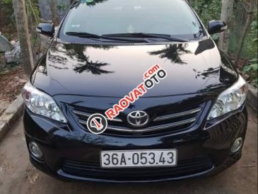 Cần bán xe cũ Toyota Corolla altis đời 2013, màu đen