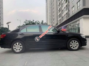 Cần bán xe Toyota Camry 2.4 năm sản xuất 2009, màu đen chính chủ, 525 triệu