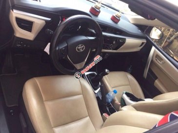 Gia đình cần bán xe Altis 2015, số sàn, màu trắng