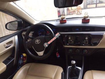 Gia đình cần bán xe Altis 2015, số sàn, màu trắng, gia đình sử dụng