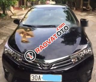 Bán Toyota Corolla Altis 1.8G AT 2014, màu đen xe gia đình