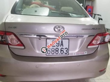 Cần bán Toyota Corolla altis sản xuất năm 2013, màu vàng chính chủ