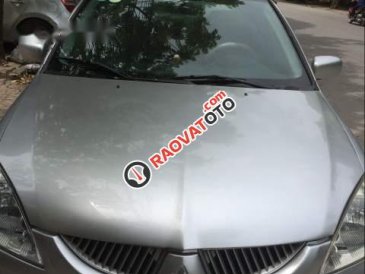 Cần bán xe Mitsubishi Lancer 1.6 AT năm sản xuất 2004, màu bạc, mọi thứ nguyên bản