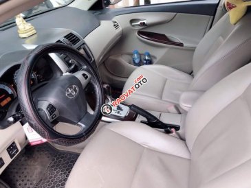 Bán Toyota Corolla altis sản xuất 2012, màu đen 