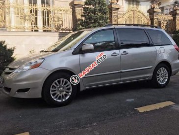Bán ô tô Toyota Sienna LE sản xuất 2009, màu bạc, nhập khẩu