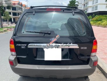 Cần bán Ford Escape XLT 3.0 AT sản xuất 2003, màu đen số tự động, 155tr
