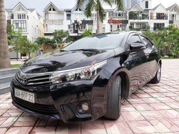 Bán Toyota Corolla altis 1.8G đời 2015, màu đen