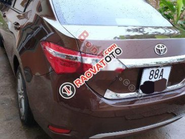Chính chủ bán xe Toyota Corolla altis 1.8G AT năm sản xuất 2015, màu nâu