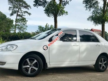 Bán Toyota Corolla altis 1.3L 2001, màu trắng, xe gia đình