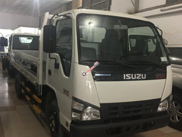 Isuzu thùng lửng KM: Máy lạnh, 12 phiếu bảo dưỡng, Radio MP3