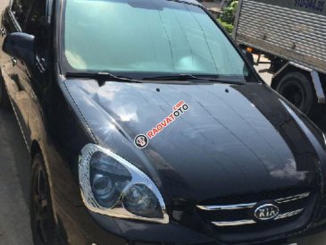 Cần bán lại xe Kia Carens SX 2.0 AT đời 2010, màu đen 