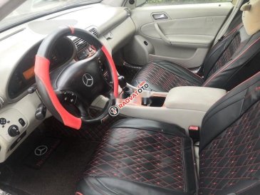 Bán xe Mercedes C200 đời 2002, màu đen số tự động
