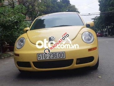 Cần bán xe Volkswagen New Beetle sản xuất 2007, màu vàng, nhập khẩu nguyên chiếc