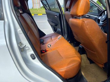 Bán ô tô Suzuki Swift 1.4 AT đời 2014, màu trắng còn mới giá cạnh tranh