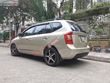 Xe Kia Carens 2.0AT năm 2010, màu vàng, nhập khẩu nguyên chiếc còn mới, giá 275tr