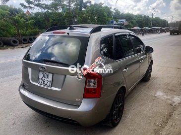 Cần bán xe Kia Carens SX 2.0AT đời 2010, màu xám
