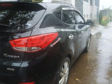 Cần bán gấp Hyundai Tucson 2.0 AT 4WD năm sản xuất 2011, màu đen, nhập khẩu nguyên chiếc, giá tốt