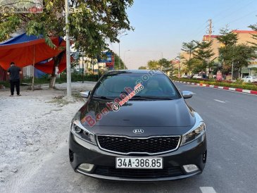 Xe Kia Cerato 1.6 MT đời 2016, màu nâu còn mới