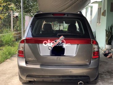 Bán Kia Carens SX 2.0AT sản xuất năm 2010, màu xám xe gia đình